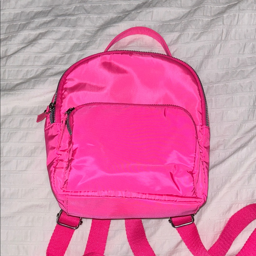 Bright pink mini backpack